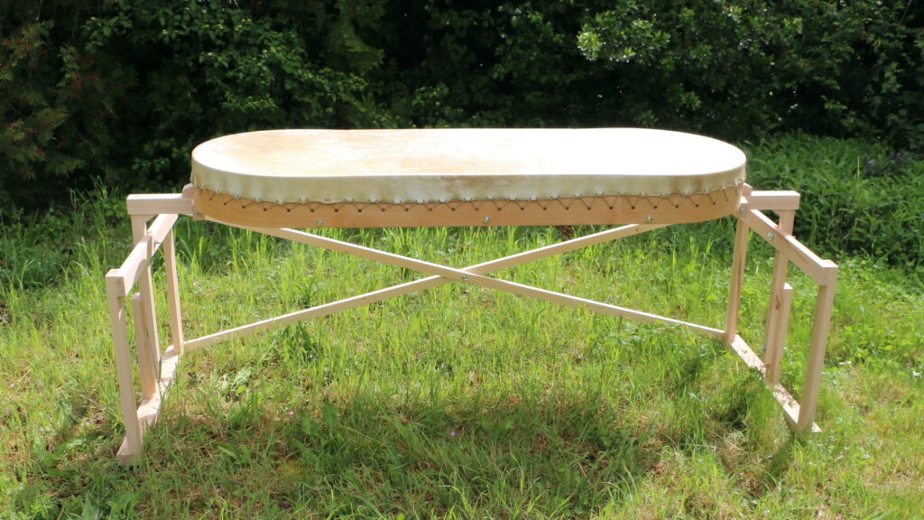 Tambour de Massage sur support à roulettes.